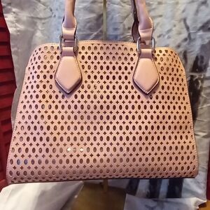 Elegant Pink Perforated Handbag